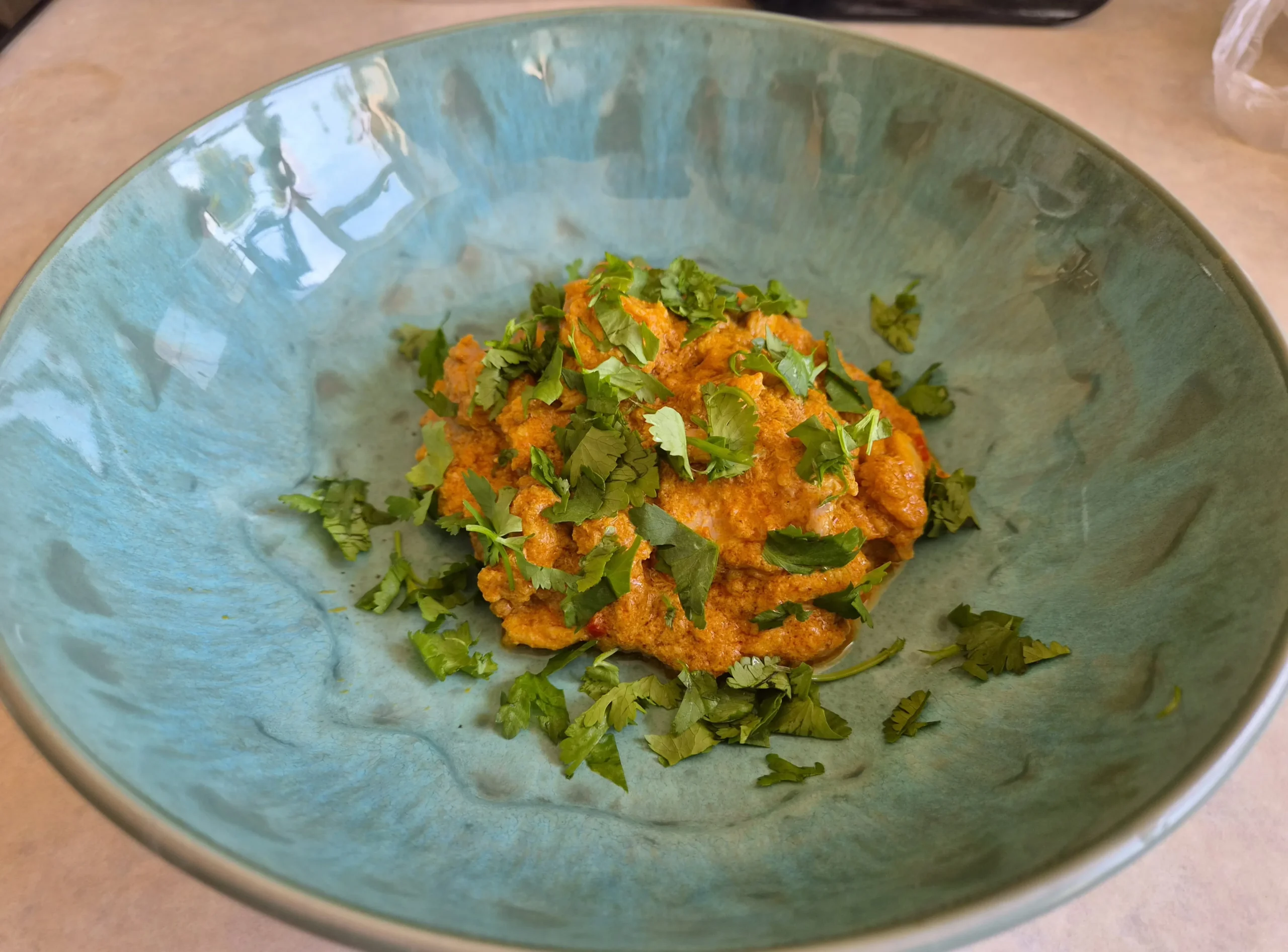 Butter chicken cooked and photographed by reader Alex Sunins with freshly ground coriander and cumin